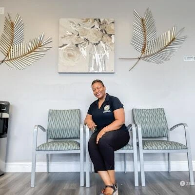 Provider smiling in her office